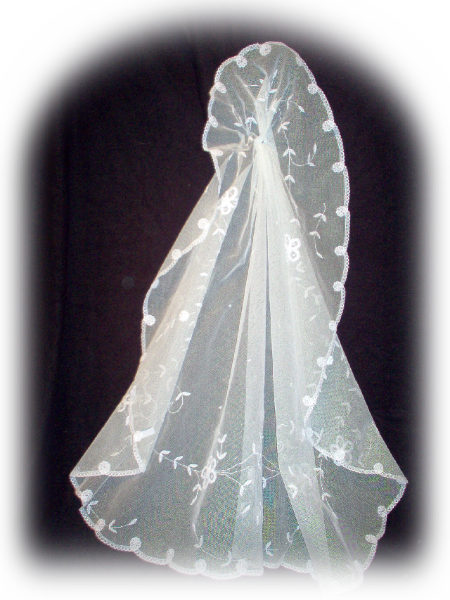 This veil is an oval cut and measures 38 inches long and 50 inches wide