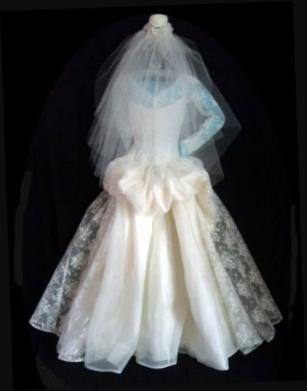 Vintage lace wedding gown with peplum
